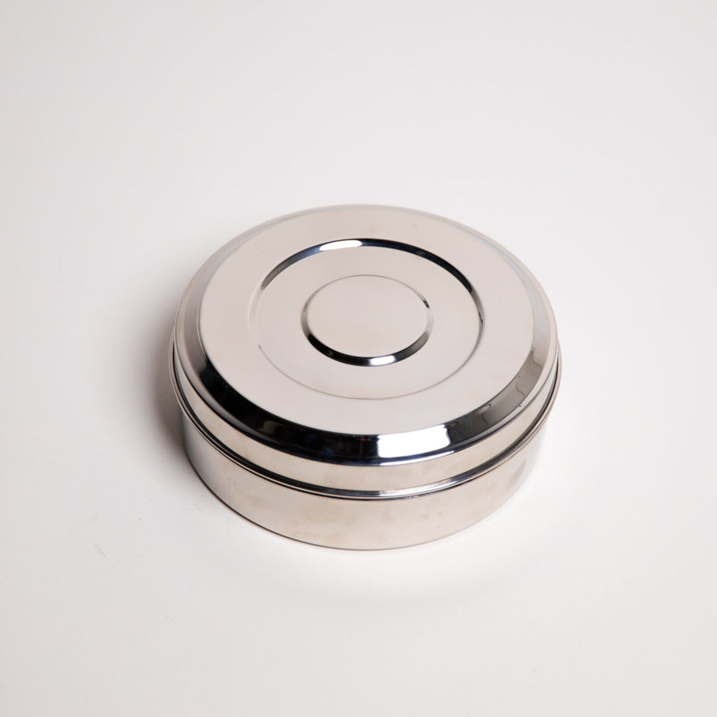 Small dense masala Dabba on white background 
