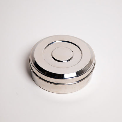 Small dense masala Dabba on white background 