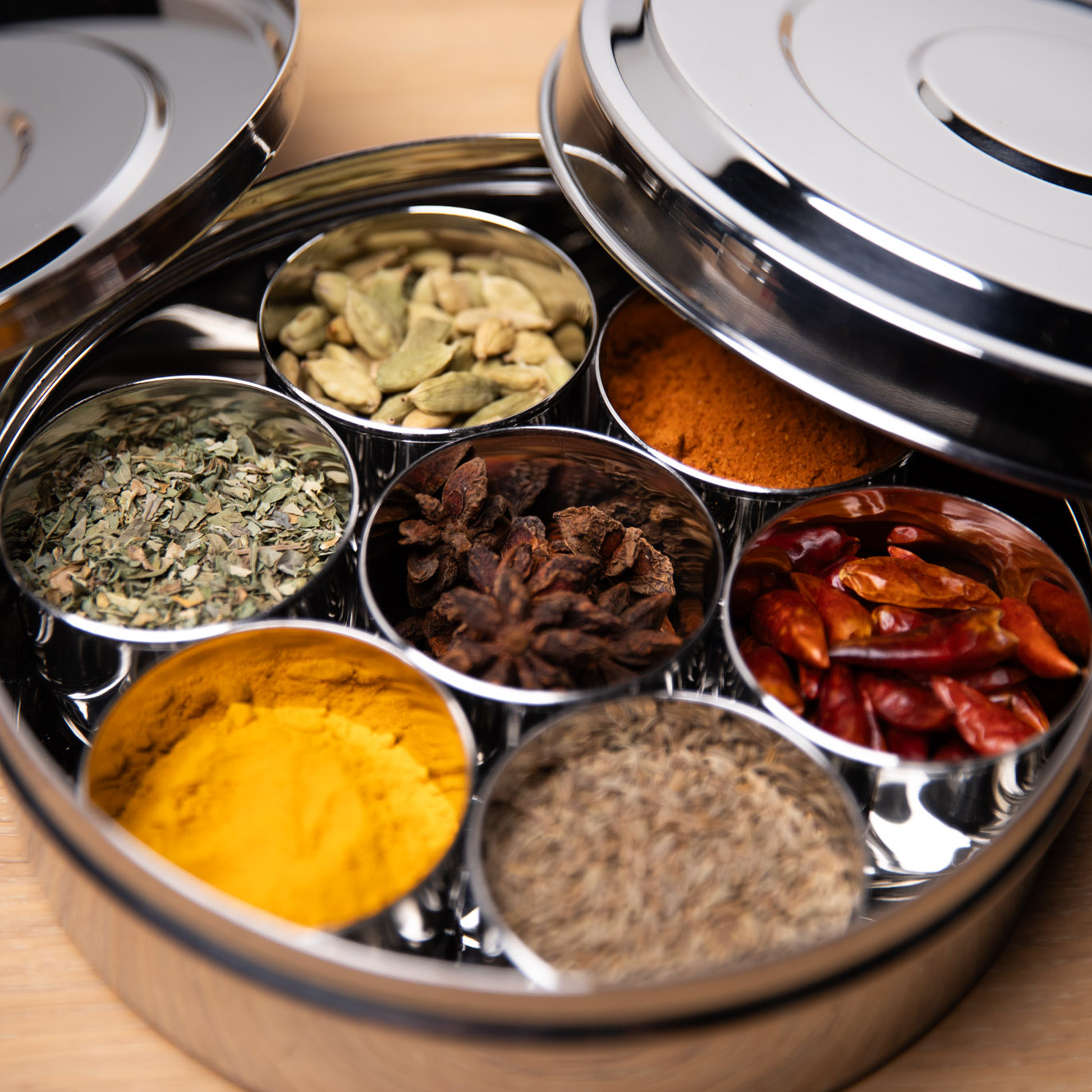 Masala Dabba small with herbs in the containers