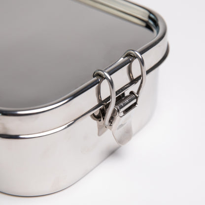 Close up of a stainless steel lunch box clip