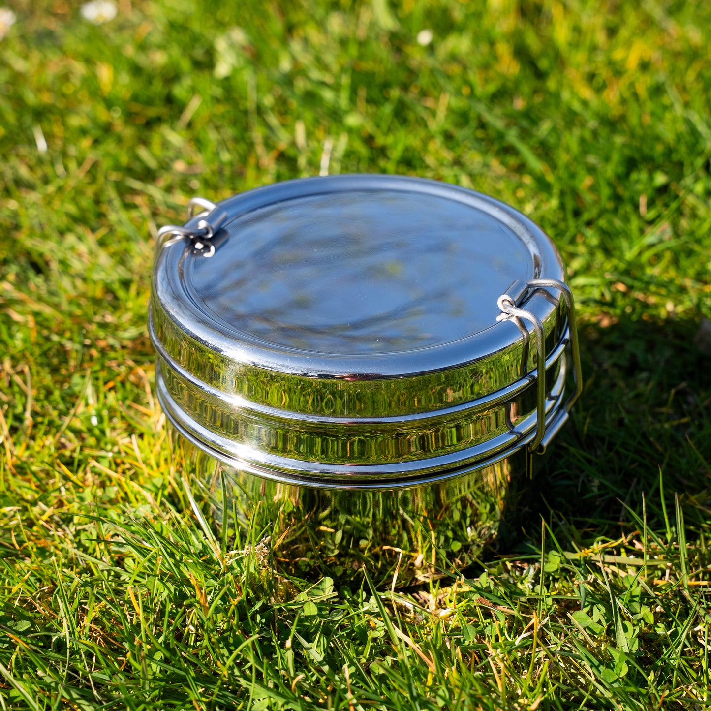 Stainless steel Round bento in the grass