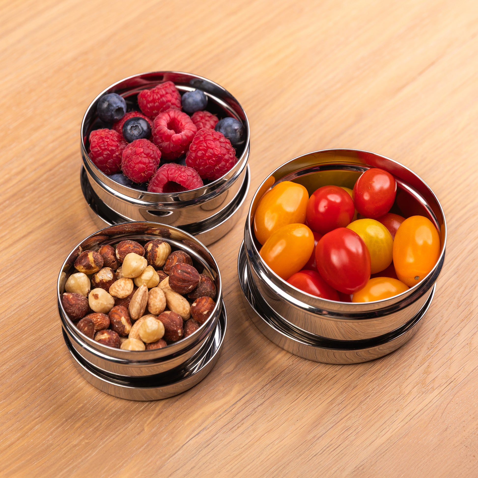 Stainless steel snack boxes on a school table
