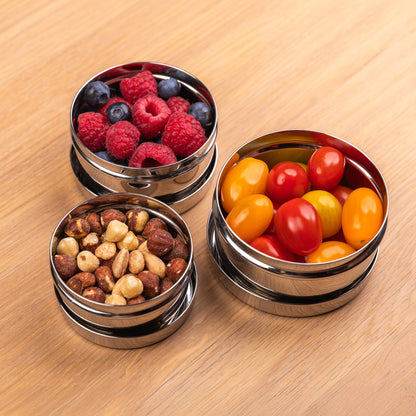 Stainless steel snack boxes on a school table