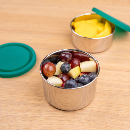 Stainless steel fruit bowl filled with fruit with silicone lid