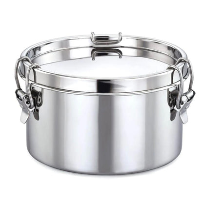 Stainless steel lunch box leak-proof round on white surface