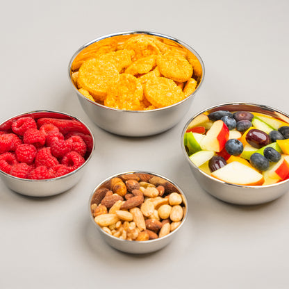 Bowls filled with food on a white background