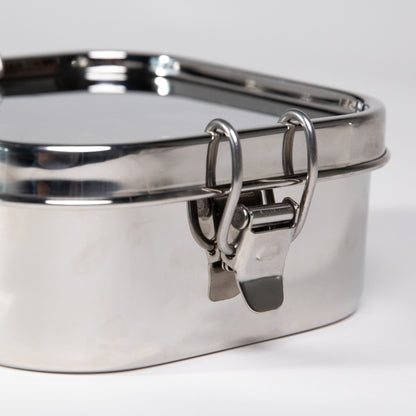Close up of a clip on a stainless steel lunch box leak-proof