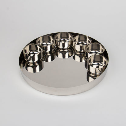 thali plate with 6 bowls from above with white background