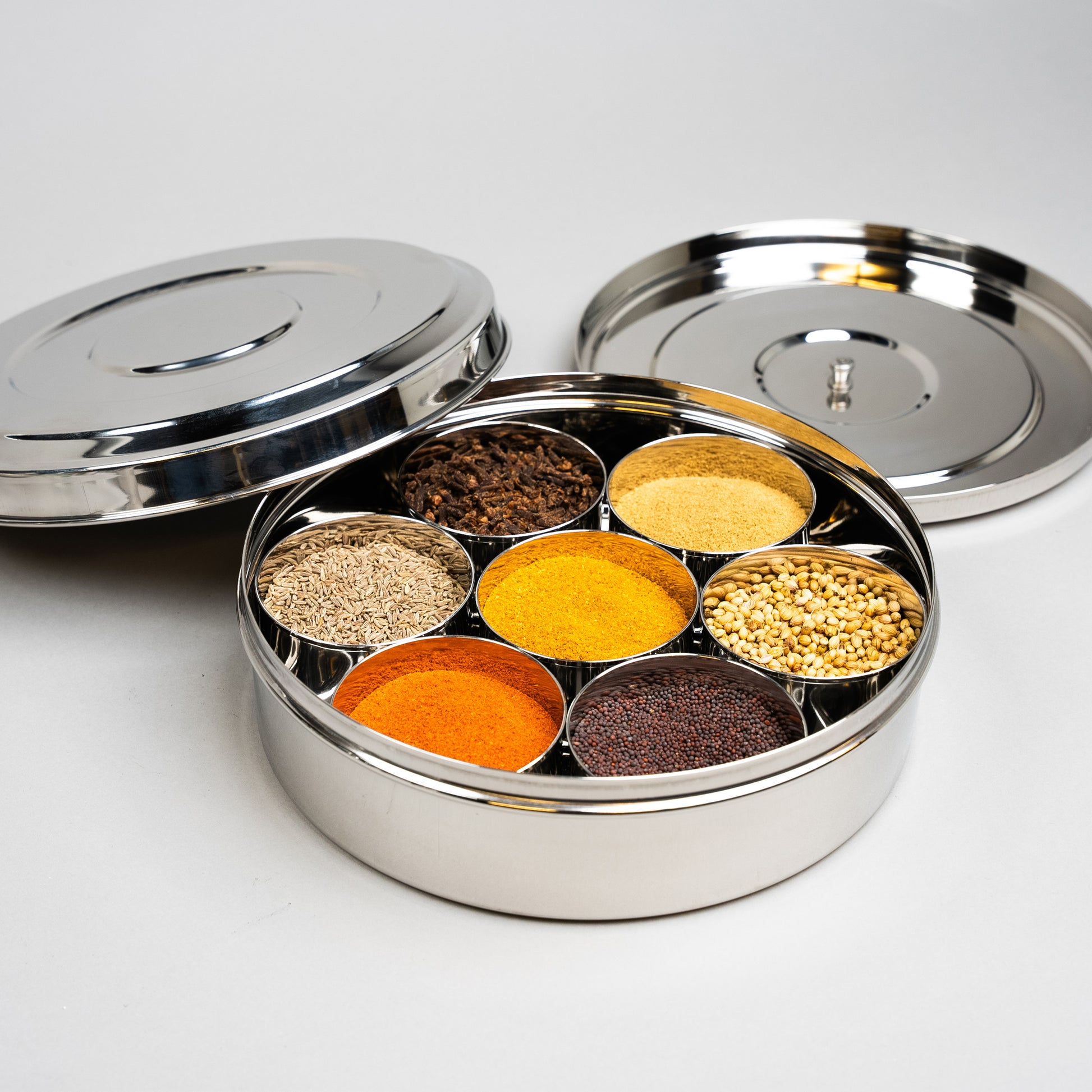 Indian spice box with spice containers