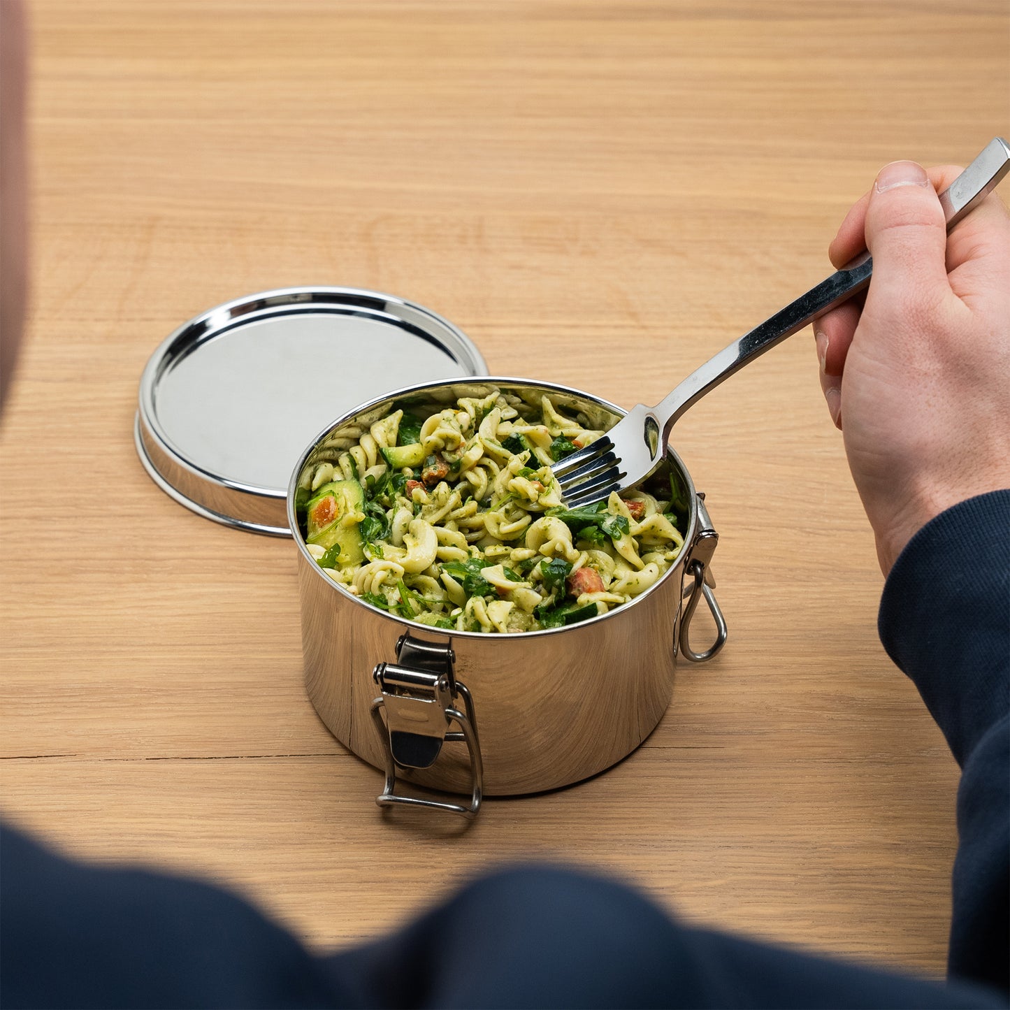 Leakproof stainless steel lunch box filled with pasta and fork