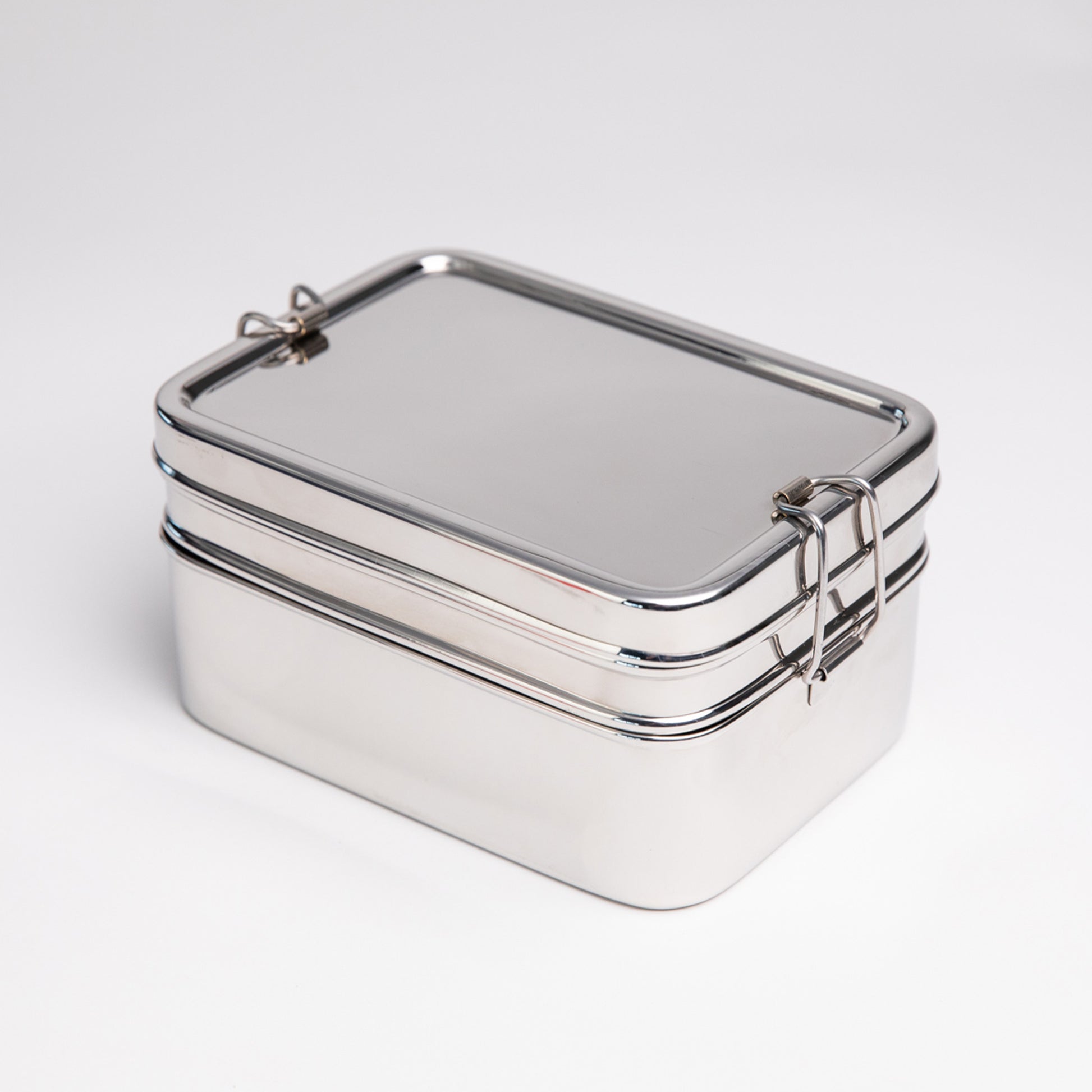 stainless steel bento lunch box with white background