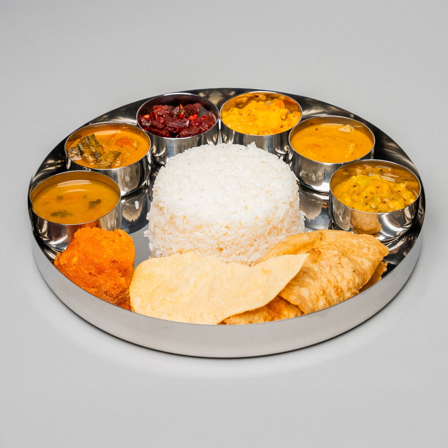 thali plate from India filled with food and rice