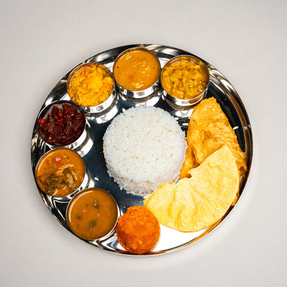thali plate from India filled with curries and rice