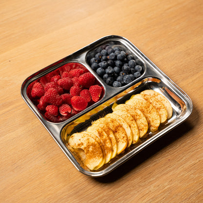 square stainless steel plate with compartments filled with fruit. ideal for barbecue 